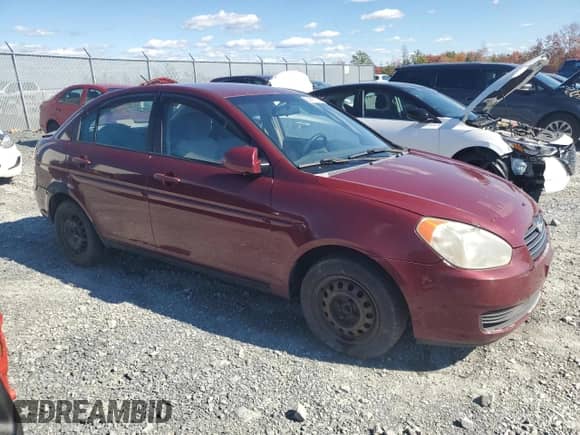 2006 Hyundai Accent GL z VIN KMHCN45C26U052459, wystawiony jako Copart lot #84417075 z przebiegiem 247 312 mil mil oraz Szkoda całkowita • Salvage title. Historia ofert i sprzedaży dostępna na DreamBid. Obrazek 4.
