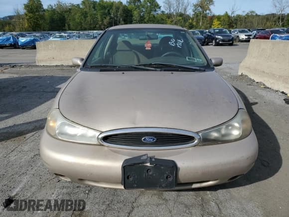 ✅ 1999 Ford Contour SE • VIN: 1FAFP6634XK189850 • Lot: 85124605. Listed on Copart with 48,359 mi. Free auction sales archive from the USA and detailed vehicle history report at DreamBid. Image 5.