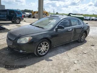 ✅ 2009 Chevrolet Malibu LTZ • VIN: 1G1ZK57779F217159 • Lot: 76239004. Listed on Copart with 201,462 mi. Free auction sales archive from the USA and detailed vehicle history report at DreamBid. Image 1.