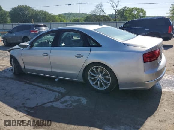 ✅ 2011 Audi A8 • VIN: WAUAVAFD7BN026927 • Lot: 54742415. Listed on Copart with 120,357 mi. Free auction sales archive from the USA and detailed vehicle history report at DreamBid. Image 2.