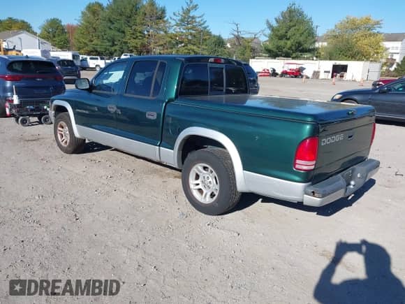 2002 Dodge Dakota SLT z VIN 1B7HL48N82S625237, wystawiony jako IAAI lot #43483399 z przebiegiem 183 405 mil mil oraz . Historia ofert i sprzedaży dostępna na DreamBid. Obrazek 3.