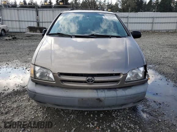 ✅ 1999 Toyota Sienna LE • VIN: 4T3ZF13C0XU133039 • Лот: 51162645. Опубликован ранее на Copart с пробегом 182 318 миль. Бесплатный доступ к архиву аукционных продаж из США и подробный отчёт об истории автомобиля на DreamBid. Изображение 5.