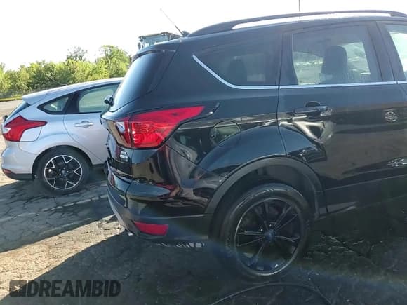 ✅ 2019 Ford Escape SEL • VIN: 1FMCU9HD8KUB25252 • Lot: 70593115. Listed on Copart with 100,204 mi. Free auction sales archive from the USA and detailed vehicle history report at DreamBid. Image 14.