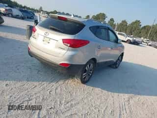 2014 Hyundai Tucson SE with VIN KM8JU3AG3EU901414, listed as a IAAI auction lot 43267845 with 141,471 mi miles and . Bid and sale history available at DreamBid. Image 4.