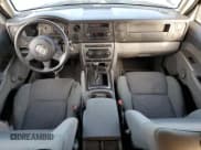 ✅ 2007 Jeep Commander Sport • VIN: 1J8HH48K57C587581 • Лот: 80295183. Опубликован ранее на Copart с пробегом 230 660 миль. Бесплатный доступ к архиву аукционных продаж из США и подробный отчёт об истории автомобиля на DreamBid. Изображение 8.