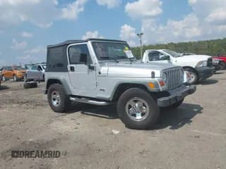 ✅ 2002 Jeep Wrangler X • VIN: 1J4FA39S02P748202 • Лот: 43266082. Опубликован ранее на IAAI с пробегом 199 437 миль. Бесплатный доступ к архиву аукционных продаж из США и подробный отчёт об истории автомобиля на DreamBid. Изображение 1.