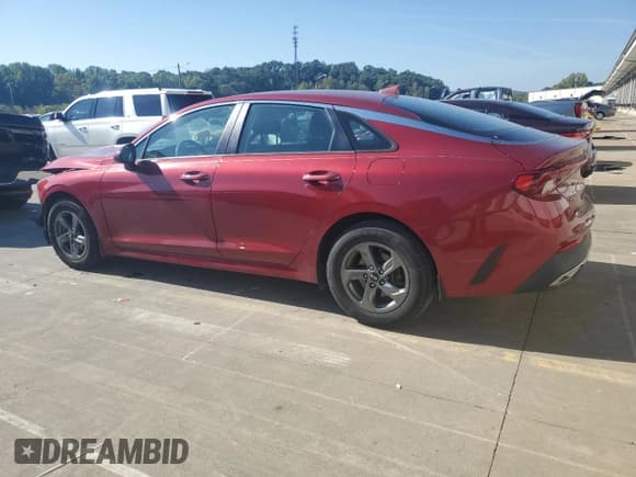 ✅ 2021 Kia K5 LX • VIN: 5XXG24J25MG031457 • Лот: 84862185. Опубликован ранее на Copart с пробегом 86 171 миль. Бесплатный доступ к архиву аукционных продаж из США и подробный отчёт об истории автомобиля на DreamBid. Изображение 2.