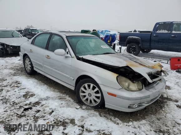 2003 Hyundai Sonata GLS с VIN KMHWF35H33A824982, выставлен на аукционе Copart как лот 84104904 с пробегом Не указан миль и Списание • Salvage title. История ставок и продаж доступна на DreamBid. Изображение 4.