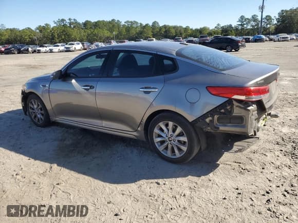 ✅ 2016 Kia Optima EX • VIN: 5XXGU4L36GG096614 • Лот: 86784105. Опубликован ранее на Copart с пробегом 141 446 миль. Бесплатный доступ к архиву аукционных продаж из США и подробный отчёт об истории автомобиля на DreamBid. Изображение 2.