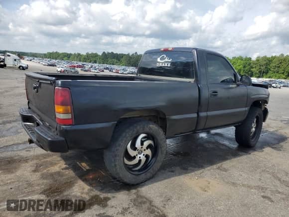 2002 Chevrolet Silverado 1500 LS with VIN 1GCEK14T72Z106860, listed as a Copart auction lot 54909765 with 301,431 mi miles and Salvage title. Bid and sale history available at DreamBid. Image 3.