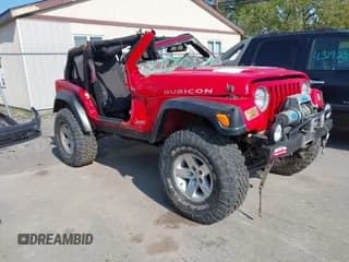 ✅ 2003 Jeep Wrangler Rubicon • VIN: 1J4FA69S63P343819 • Lot: 43195848. Listed on IAAI with 23,371 mi. Free auction sales archive from the USA and detailed vehicle history report at DreamBid. Image 1.