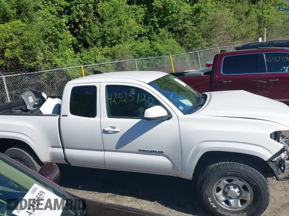 ✅ 2022 Toyota Tacoma SR • VIN: 3TYRX5GN4NT056386 • Lot: 42325120. Listed on IAAI with 57,703 mi. Free auction sales archive from the USA and detailed vehicle history report at DreamBid. Image 14.
