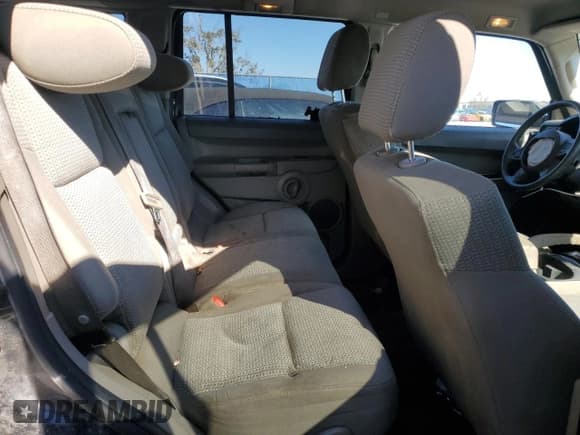 ✅ 2006 Jeep Commander • VIN: 1J8HH48K16C106515 • Lot: 82670514. Listed on Copart with 232,689 mi. Free auction sales archive from the USA and detailed vehicle history report at DreamBid. Image 11.