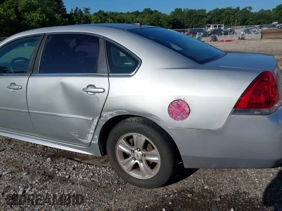 ✅ 2014 Chevrolet Impala LS • VIN: 2G1WA5E39E1128068 • Lot: 42521329. Listed on IAAI with 229,730 mi. Free auction sales archive from the USA and detailed vehicle history report at DreamBid. Image 6.