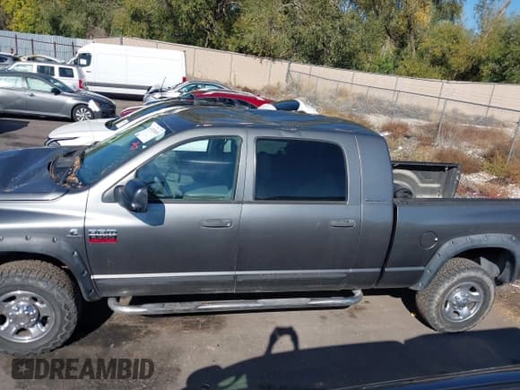 ✅ 2007 Dodge 2500 SLT • VIN: 3D7KS29C07G750571 • Lot: 43476668. Wystawiony na IAAI z przebiegiem 234 858 mil. Bezpłatny archiwum sprzedaży aukcyjnych z USA i szczegółowy raport historii pojazdu na DreamBid. Zdjęcie 14.