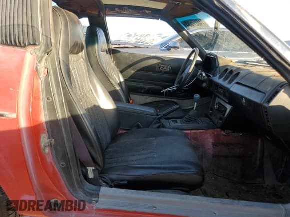 ✅ 1983 Datsun 280ZX • VIN: JN1HZ04S0DX569855 • Лот: 74027594. Опубликован ранее на Copart с пробегом 12 300 миль. Бесплатный доступ к архиву аукционных продаж из США и подробный отчёт об истории автомобиля на DreamBid. Изображение 10.