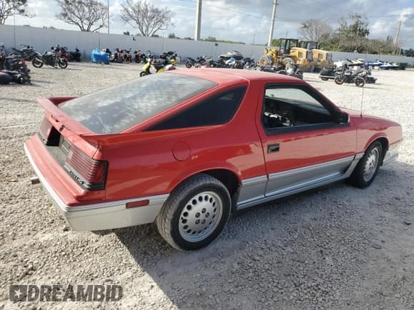 ✅ 1986 Dodge Daytona • VIN: 1B3BA64E7GG134747 • Lot: 44496925. Listed on Copart with Not provided. Free auction sales archive from the USA and detailed vehicle history report at DreamBid. Image 3.