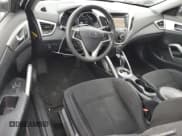 ✅ 2015 Hyundai Veloster • VIN: KMHTC6AD7FU245237 • Lot: 81167464. Wystawiony na Copart z przebiegiem 206 237 mil. Bezpłatny archiwum sprzedaży aukcyjnych z USA i szczegółowy raport historii pojazdu na DreamBid. Zdjęcie 8.