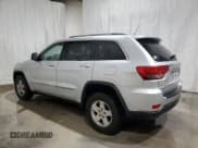 ✅ 2012 Jeep Grand Cherokee Laredo • VIN: 1C4RJFAG1CC120752 • Lot: 93726045. Listed on Copart with 207,479 mi. Free auction sales archive from the USA and detailed vehicle history report at DreamBid. Image 2.