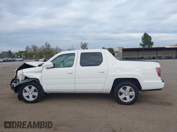 ✅ 2014 Honda Ridgeline RTL • VIN: 5FPYK1F57EB001037 • Lot: 41472136. Wystawiony na IAAI z przebiegiem 140 246 mil. Bezpłatny archiwum sprzedaży aukcyjnych z USA i szczegółowy raport historii pojazdu na DreamBid. Zdjęcie 14.