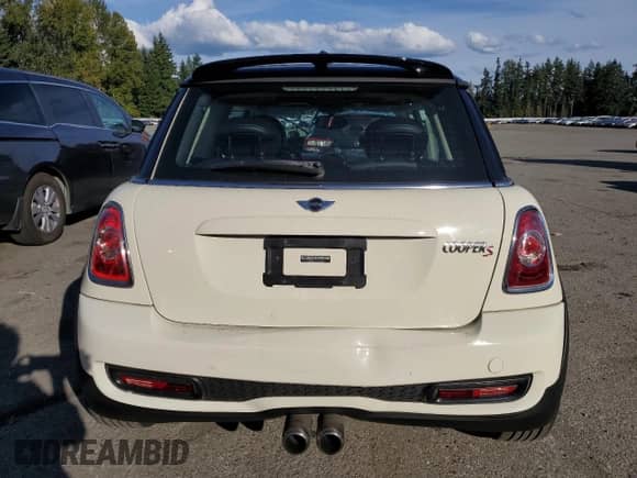 2013 MINI Hardtop S with VIN WMWSV3C55DT390937, listed as a Copart auction lot 85303445 with 94,625 mi miles and Salvage title. Bid and sale history available at DreamBid. Image 6.