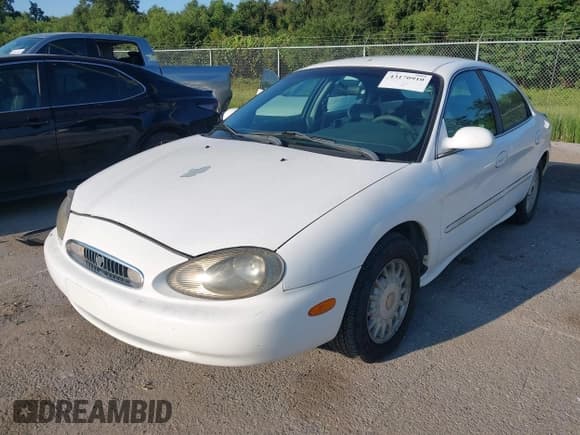 ✅ 1998 Mercury Sable GS • VIN: 1MEFM50U7WA604631 • Lot: 43170910. Listed on IAAI with 58,970 mi. Free auction sales archive from the USA and detailed vehicle history report at DreamBid. Image 2.