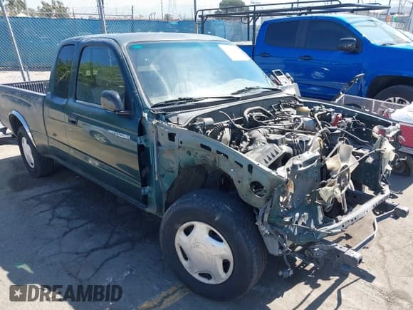 ✅ 1999 Toyota Tacoma • VIN: 4TAVL52N6XZ536651 • Lot: 36927615. Wystawiony na IAAI z przebiegiem 187 436 mil. Bezpłatny archiwum sprzedaży aukcyjnych z USA i szczegółowy raport historii pojazdu na DreamBid. Zdjęcie 1.