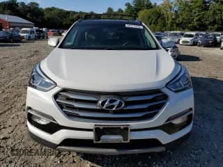 ✅ 2018 Hyundai Santa Fe 2.4L • VIN: 5XYZUDLB0JG570897 • Лот: 68774123. Опубликован ранее на Copart с пробегом 83 988 миль. Бесплатный доступ к архиву аукционных продаж из США и подробный отчёт об истории автомобиля на DreamBid. Изображение 5.