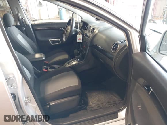 ✅ 2013 Chevrolet Captiva Sport LT • VIN: 3GNAL3EK2DS632530 • Lot: 42592417. Wystawiony na IAAI z przebiegiem 128 020 mil. Bezpłatny archiwum sprzedaży aukcyjnych z USA i szczegółowy raport historii pojazdu na DreamBid. Zdjęcie 5.