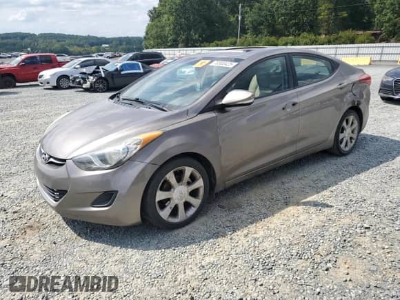 2012 Hyundai Elantra Limited with VIN 5NPDH4AE7CH083042, listed as a Copart auction lot 70300425 with 166,143 mi miles and Salvage title. Bid and sale history available at DreamBid. Image 1.