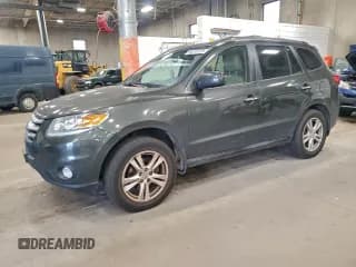 ✅ 2012 Hyundai Santa Fe Limited • VIN: 5XYZKDAG5CG112537 • Лот: 94415775. Опубликован ранее на Copart с пробегом 280 337 миль. Бесплатный доступ к архиву аукционных продаж из США и подробный отчёт об истории автомобиля на DreamBid. Изображение 1.