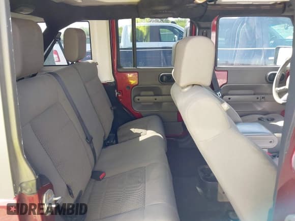 ✅ 2008 Jeep Wrangler Unlimited Sahara • VIN: 1J4GA59168L551896 • Lot: 42173185. Listed on IAAI with 192,394 mi. Free auction sales archive from the USA and detailed vehicle history report at DreamBid. Image 8.