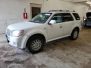 ✅ 2009 Mercury Mariner Premier • VIN: 4M2CU97G49KJ26012 • Lot: 68007975. Listed on Copart with 153,173 mi. Free auction sales archive from the USA and detailed vehicle history report at DreamBid. Image 1.