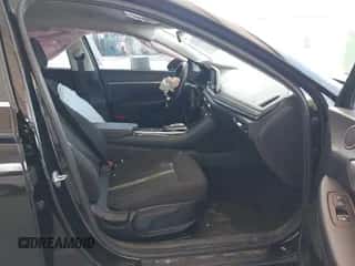 2022 Hyundai Sonata SE z VIN KMHL24JA5NA217594, wystawiony jako IAAI lot #42939716 z przebiegiem 94 444 mil mil oraz . Historia ofert i sprzedaży dostępna na DreamBid. Obrazek 5.