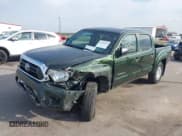 ✅ 2012 Toyota Tacoma • VIN: 3TMLU4EN8CM102502 • Lot: 43363011. Listed on IAAI with 255,969 mi. Free auction sales archive from the USA and detailed vehicle history report at DreamBid. Image 2.