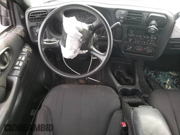 2003 Chevrolet S-10 LS z VIN 1GCDT13X53K125186, wystawiony jako Copart lot #72440074 z przebiegiem Nie podano mil oraz Szkoda całkowita • Salvage title. Historia ofert i sprzedaży dostępna na DreamBid. Obrazek 8.