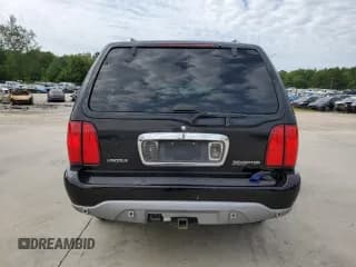 ✅ 2000 Lincoln Navigator • VIN: 5LMRU27A6YLJ02461 • Лот: 65460334. Опубликован ранее на Copart с пробегом 135 699 миль. Бесплатный доступ к архиву аукционных продаж из США и подробный отчёт об истории автомобиля на DreamBid. Изображение 6.
