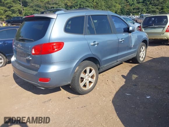 ✅ 2009 Hyundai Santa Fe SE • VIN: 5NMSH13E09H304005 • Lot: 43024287. Listed on IAAI with 153,828 mi. Free auction sales archive from the USA and detailed vehicle history report at DreamBid. Image 4.