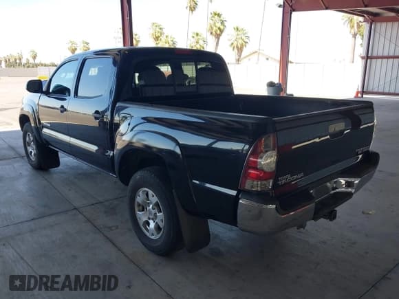 ✅ 2013 Toyota Tacoma PreRunner • VIN: 3TMJU4GN0DM145723 • Lot: 42785140. Listed on IAAI with 217,595 mi. Free auction sales archive from the USA and detailed vehicle history report at DreamBid. Image 3.