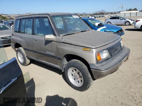 ✅ 1995 Suzuki Sidekick JS • VIN: 2S3TE02V1S6406369 • Lot: 67108335. Listed on Copart with 114,976 mi. Free auction sales archive from the USA and detailed vehicle history report at DreamBid. Image 4.