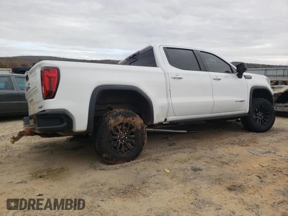 ✅ 2023 GMC Sierra 1500 AT4X • VIN: 3GTUUFEL4PG190502 • Лот: 77668724. Опубликован ранее на Copart с пробегом 27 464 миль. Бесплатный доступ к архиву аукционных продаж из США и подробный отчёт об истории автомобиля на DreamBid. Изображение 3.