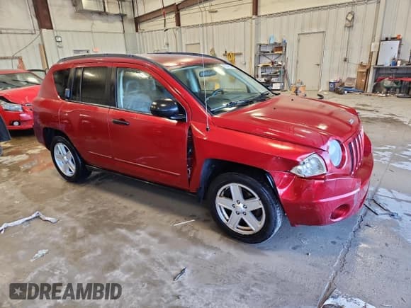 ✅ 2008 Jeep Compass Sport • VIN: 1J8FT47W28D705415 • Lot: 90346925. Listed on Copart with 129,817 mi. Free auction sales archive from the USA and detailed vehicle history report at DreamBid. Image 4.