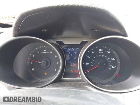 2013 Hyundai Veloster w/Black Int с VIN KMHTC6AD3DU099707, выставлен на аукционе IAAI как лот 43076379 с пробегом 128 517 миль миль и . История ставок и продаж доступна на DreamBid. Изображение 7.