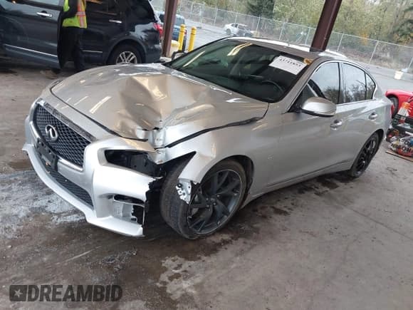 ✅ 2015 Infiniti Q50 Premium • VIN: JN1BV7AP3FM335210 • Lot: 43711853. Listed on IAAI with 102,947 mi. Free auction sales archive from the USA and detailed vehicle history report at DreamBid. Image 2.