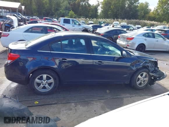 2014 Chevrolet Cruze 1LT with VIN 1G1PC5SB0E7352097, listed as a IAAI auction lot 43435690 with 149,332 mi miles and . Bid and sale history available at DreamBid. Image 14.