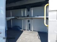 ✅ 2021 Ford Transit Cargo • VIN: 1FTBR3X84MKA54150 • Lot: 41671756. Listed on IAAI with 96,556 mi. Free auction sales archive from the USA and detailed vehicle history report at DreamBid. Image 8.