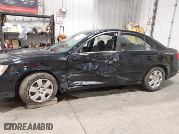 ✅ 2009 Hyundai Sonata GLS • VIN: 5NPET46C69H410923 • Lot: 43199574. Listed on IAAI with 185,018 mi. Free auction sales archive from the USA and detailed vehicle history report at DreamBid. Image 14.