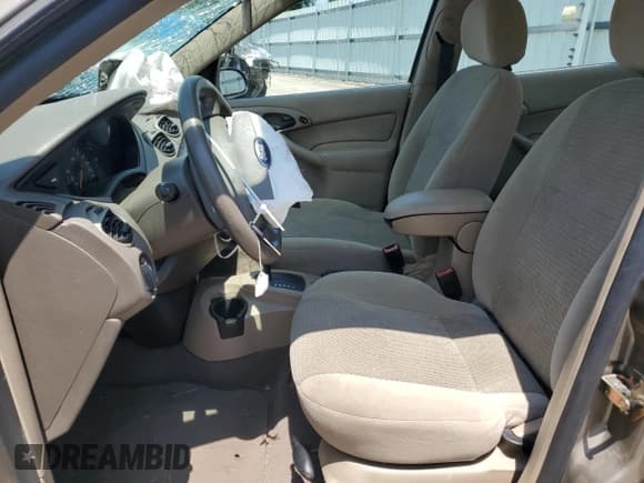 ✅ 2003 Ford Focus SE • VIN: 1FAFP34323W241979 • Лот: 59255185. Опубликован ранее на Copart с пробегом 49 883 миль. Бесплатный доступ к архиву аукционных продаж из США и подробный отчёт об истории автомобиля на DreamBid. Изображение 7.