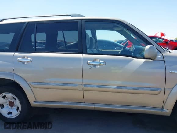 ✅ 2003 Suzuki XL7 Touring • VIN: JS3TX92V534103046 • Lot: 41978971. Listed on IAAI with 185,038 mi. Free auction sales archive from the USA and detailed vehicle history report at DreamBid. Image 13.