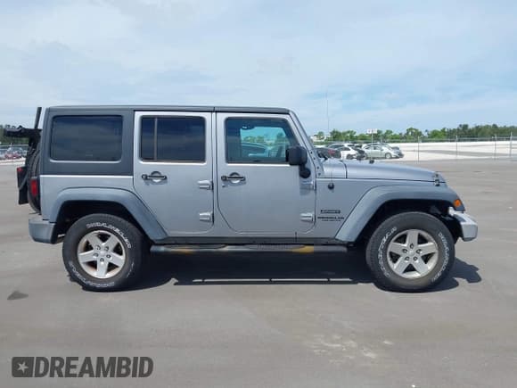✅ 2016 Jeep Wrangler Unlimited Sport • VIN: 1C4BJWDG8GL160474 • Lot: 43128973. Listed on IAAI with 33,182 mi. Free auction sales archive from the USA and detailed vehicle history report at DreamBid. Image 13.